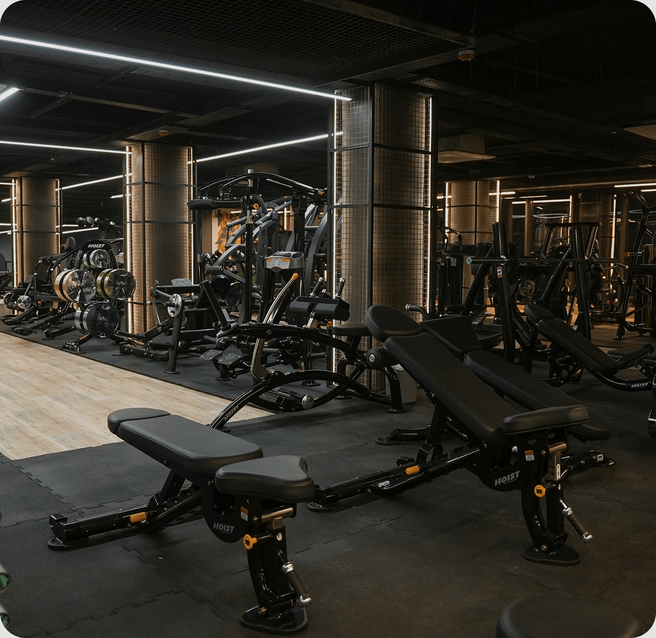 Man talking to woman in workout facility