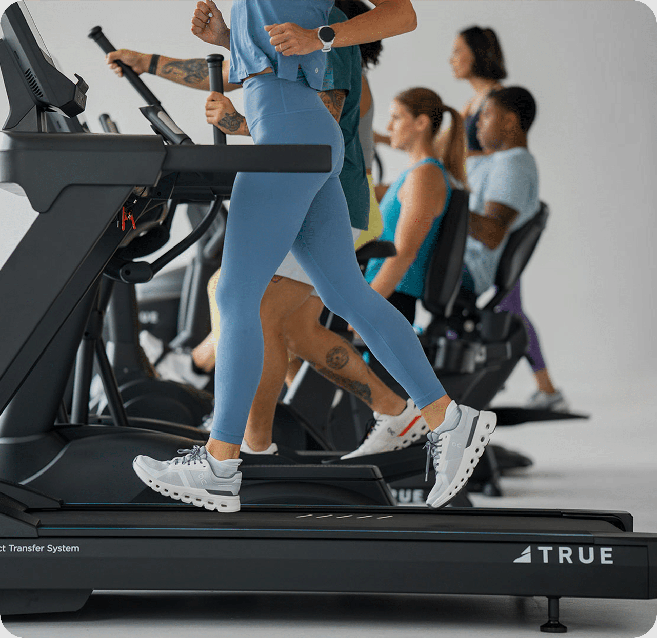Man talking to woman in workout facility