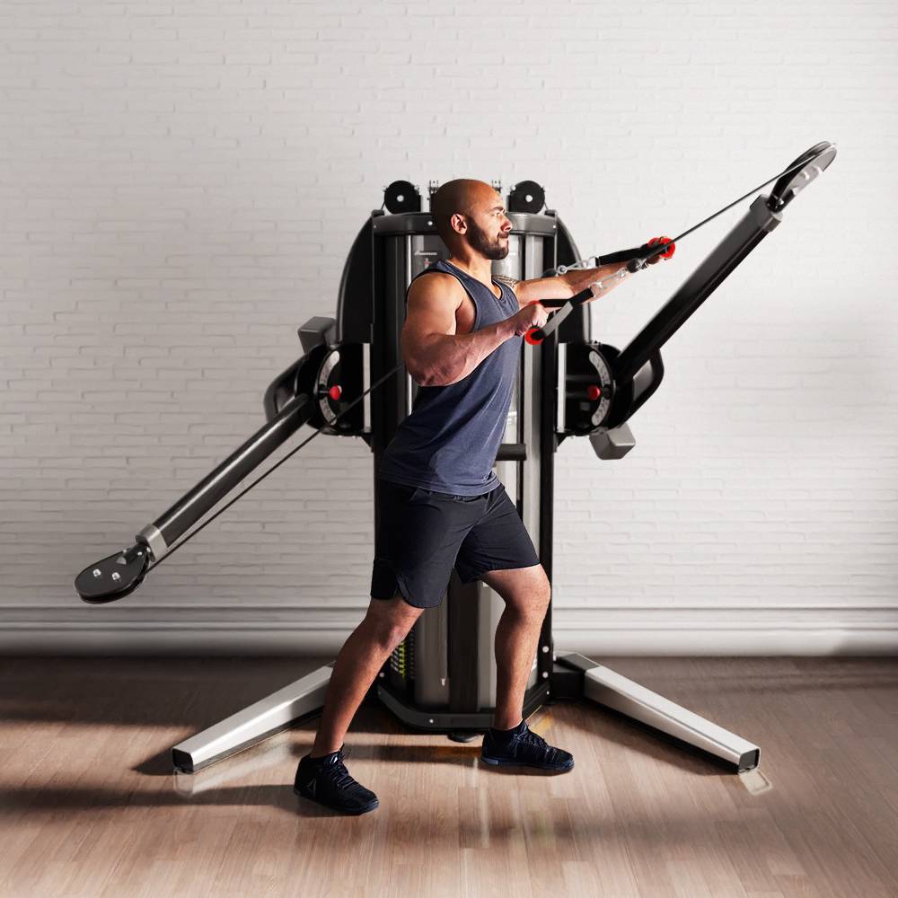 Man talking to woman in workout facility